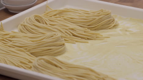 Fresh-pasta-on-tray-in-the-kitchen-of-an-upscale-restaurant