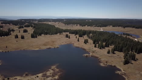 Panning-aerial-shot-of-Grand-Mesa-snow-melt-lakes