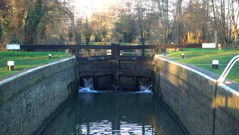 Closed-gates-at-a-canal-Lock-on-a-sunny-winter-morning-in-England