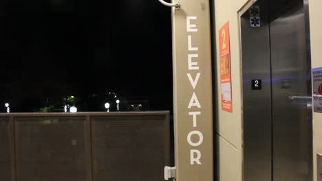 elevator-sign-in-public-parking