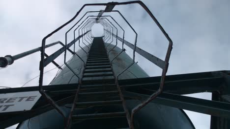 Ladder-on-Silo-at-Quarry-POV-Looking-up-Shot