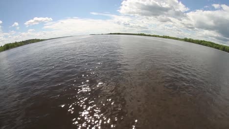 Wide-curved-shot-of-big-river-crossing