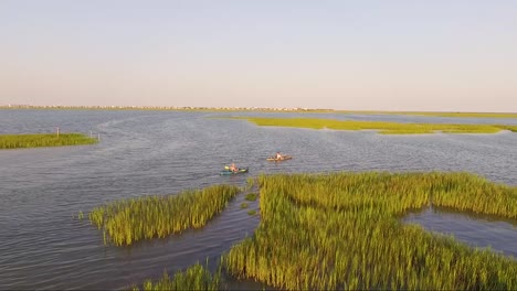 Drone-tracking-kayakers-in-Wooland-Creek-near-Murrells-Inlet-SC-at-sunset