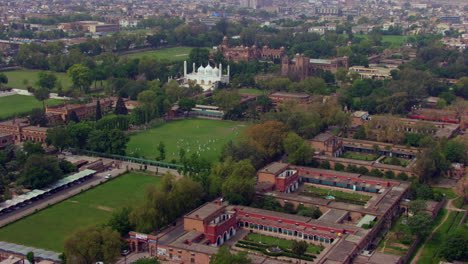 old-heritage-buildings-aerial-view-with-green-trees-and-city,-old-govt-officials-buildings,-Beautiful-parks-and-play-grounds,-children-are-playing
