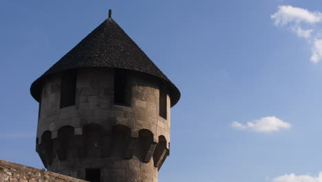 Old-European-medieval-tower-in-hungary,-part-of-a-larger-castle