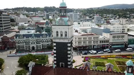 Drone-view-of-the-historic-railway-station-of-Dunedin,-New-Zealand