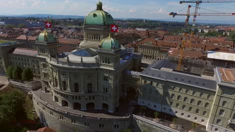 Aerial-view-of-the-Federal-Palace-of-Switzerland,-House-of-Parliament,-Bern-the-capital-of-Switzerland