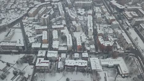 Aerial-view-of-small-town-covered-in-snow