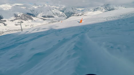 go-pro-on-snowboard-with-fast-movement-in-livigno,-italian-alps