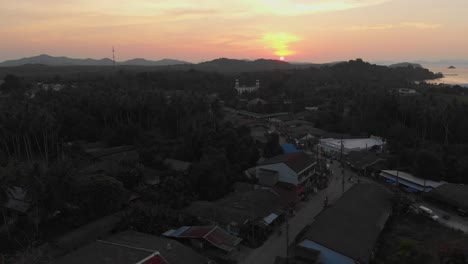 Sunset-over-a-small-island-village----Drone-shot-1