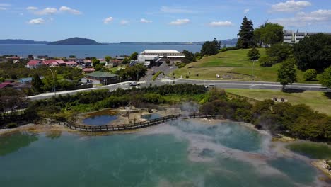 Aerial-shot-of-hot-spring,-natural-steamy-thermal-basin---New-Zealand,-Rotorua,-Kuirau-Park