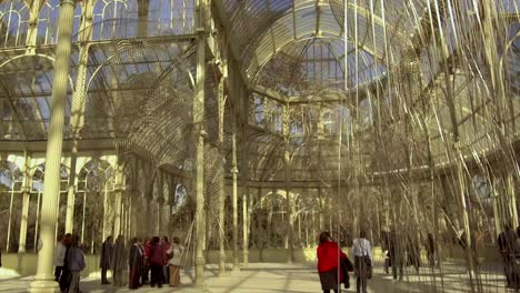 Palacio-de-Cristal,-glass-house-attraction-in-Retiro-Park,-Madrid,-Gimbal-pan-and-tilt