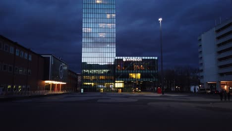 Blue-hour-at-the-Basel-Messe-tower-during-a-winter-storm
