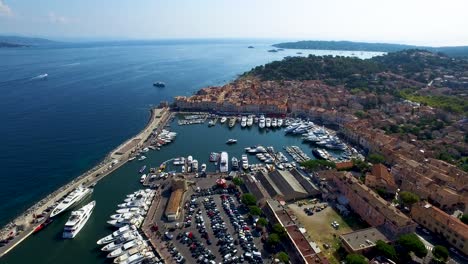 Aerial-view-of-the-old-harbor-of-Saint-Tropez-with-luxury-yachts