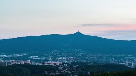 Timelapse-of-Liberec-city-with-Jested-in-the-evening,-static-view,-Czech-Republic