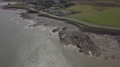 Aerial-Pan-of-"High-Rock"-swimming-point-near-the-Irish-village-of-Portmarnock