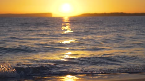 Sunrise-over-Australian-beach-and-waves