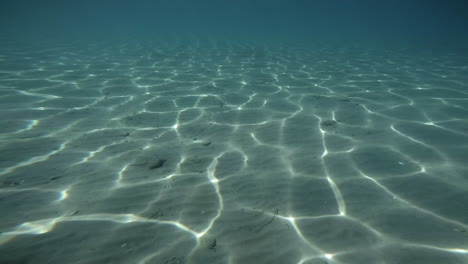 Underwater-POV-footage-of-a-man-swimming-at-Kalamata,-Greece
