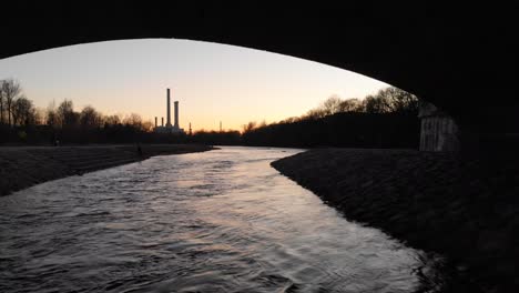 Sunset-view-of-a-bridge-on-Isar-river-Munich-Germany