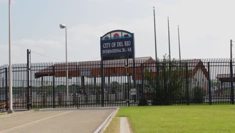 International-Bridge-Entrance-in-Del-Rio-Texas-viewed-from-opposite-side-of-the-border-fence