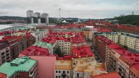 Aerial-footage-over-Heden-in-Gothenburg-showing-som-amazing-old-apartments-with-the-famous-hotel-Gothia-Towers-and-the-amusement-park-Liseberg-in-the-background