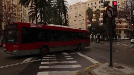 Public-City-bus-passes-by-from-right-to-left-in-Europe-in-valencia-spain