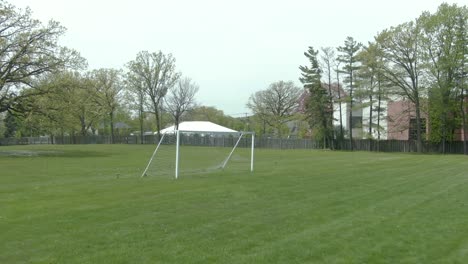 Dolly-zoom-of-a-soccer-football-goal-during-a-sunny-summer-afternoon