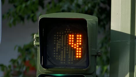 A-traffic-light-countdown-from-ten-to-red-man-figure