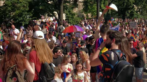 Colorful-people-getting-ready-to-march-in-the-Budapest-Pride,-big-crowd-getting-started