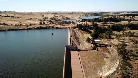 Aerial-view-of-the-Upper-Coliban-Reservoir-dam-wall,-central-Victoria,-Australia,-January-2019