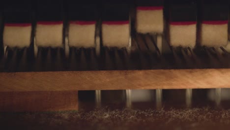 close-up-detail-of-piano-strings-and-hammers-,-abstract-music-video-artistic-footage-music-instrument