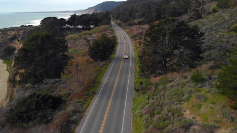 Aerial-of-Motorcyclist-Riding-on-California-Coast-Highway-One