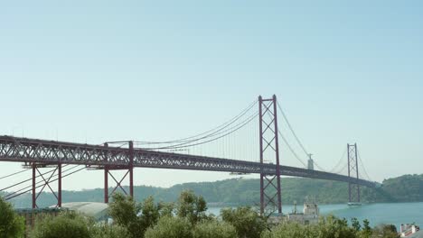 Lisbon-25th-April-bridge,-in-sunny-day-with-blue-sky
