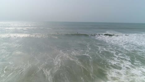 Drone-videos-of-People-surfing-on-a-Beach-in-India-,4K-60-fps-down-scaled-t0-30-fps