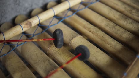 Slow-Motion-handheld-shot-of-someone-playing-an-Indonesian-Xylophone