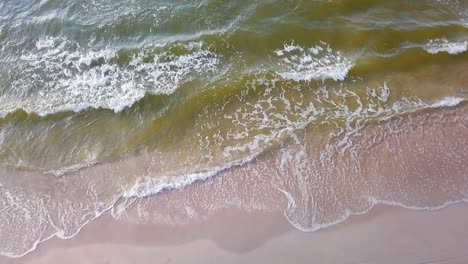 Aerial-View-Of-Sea-Waves-On-Sandy-Beach-Of-Baltic-Sea