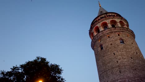 Slow-Motion:View-of-popular-ancient-Galata-Tower-in-the-evening