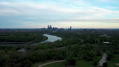 Aerial-drone-far-away-view-of-Philadelphia-city-skyline-from-Belmont-Plateau-including-Schuylkill-river-and-west-Philadelphia