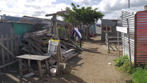 Backstreets-between-shacks-in-township,-Zwelihle-South-Africa