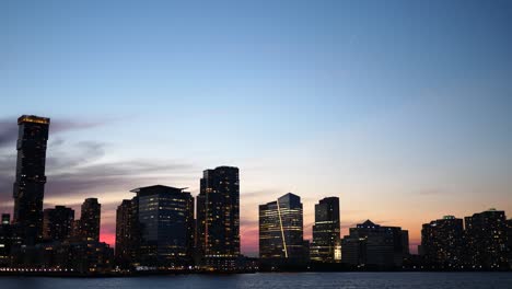 View-of-the-New-Jersey-Waterfront-at-dusk-from-a-boat-on-the-Hudson-River