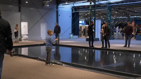 young-boy-attending-in-fishing-class-indoors