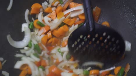 Stir-Fry-fresh-vegetables-in-wok,-bright-and-steamy