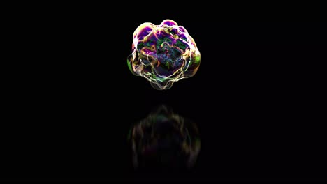 Realistic-animated-soap-bubble-floating-with-a-slight-reflection-on-the-black-surface-below-it