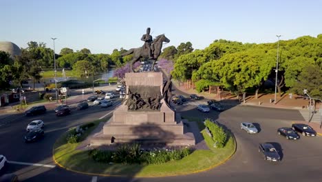 Aerial-shot-of-cars-driving-around-Justo-Jose-de-Urquiza-monument,-Buenos-Aires