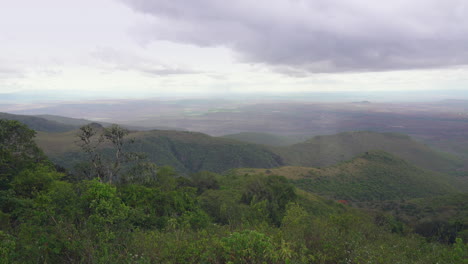 Rain-falling-on-thick-green-mountainside-overlooking-the-Great-Rift-Valley
