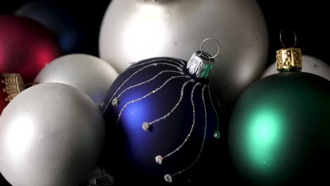 Closeup-of-multi-colored-christmas-ball-ornaments.-Tracking-shot