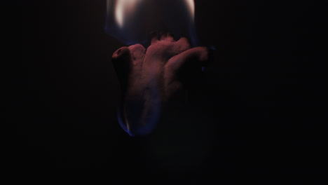 Slow-motion-closeup-of-an-anatomically-correct-heart-on-fire