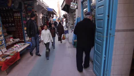 Steadicam-motion-moving-down-alleys-of-Essaouira,-Morocco