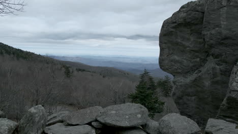 Looking-past-a-larger-mountain-rock-over-the-blue-ridge-mountains