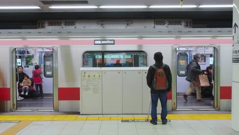 Metro-doors-and-safety-gates-close-in-slow-motion-at-underground-Shibuya-station